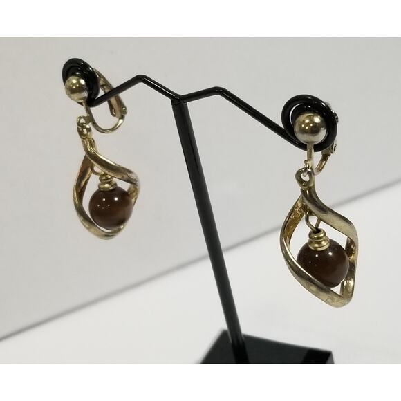 one inch clip on gold tone dangle brown cats eye earrings - Picture 5 of 9